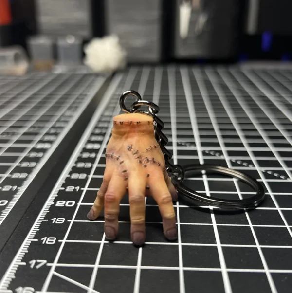 Wednesday-Inspired Thing Hand Keychain — design reference