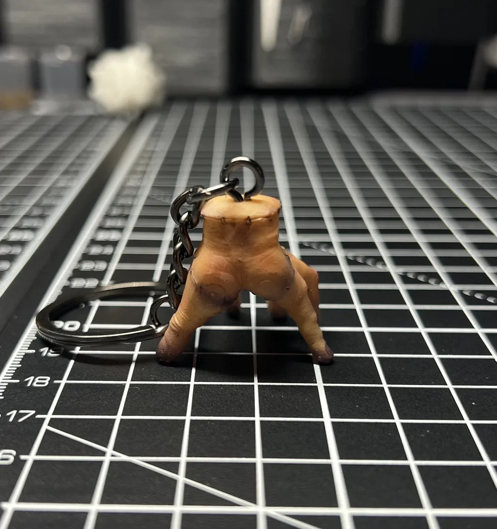 Wednesday-Inspired Thing Hand Keychain &mdash; design reference